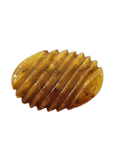 Load image into Gallery viewer, 1940s Carved Bakelite Butterscotch Ribbed Brooch

