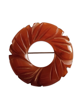 Load image into Gallery viewer, 1940s Rust Bakelite Carved Circle Brooch
