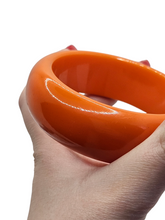 Load image into Gallery viewer, 1950s Bright Chunky Orange Bakelite Bangle
