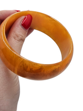 Load image into Gallery viewer, 1940s Marbled Orange Bakelite Bangle
