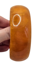 Load image into Gallery viewer, 1940s Marbled Orange Bakelite Bangle
