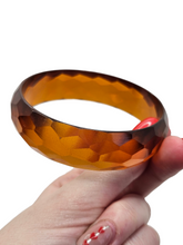 Load image into Gallery viewer, 1940s Iced Tea Faceted Bakelite Bangle
